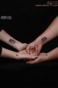 武汉专业纹身店：情侣手臂骷髅纹身图案作品