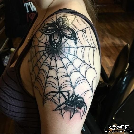 手臂蜘蛛网纹身图案